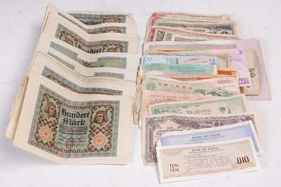 Lot 279 - A collection of banknotes, to include thirty...