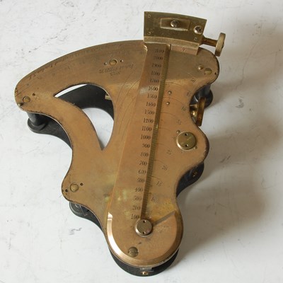 Lot 192 - A Military brass range finder, inscribed ‘Capt....