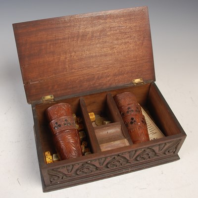 Lot 223 - A carved wood cigar box, with ‘Bedu’ gaming...