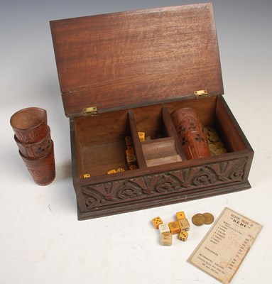 Lot 223 - A carved wood cigar box, with ‘Bedu’ gaming...