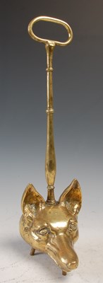 Lot 227 - A cast brass Country House door stop, formed...