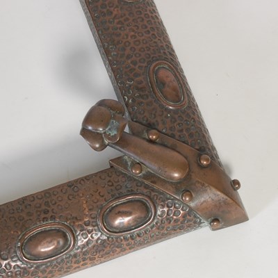 Lot 209 - An Art Nouveau copper fender, embossed with...