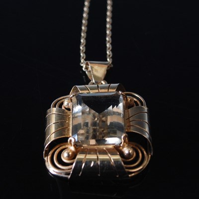 Lot 675 - A 1920’s 14ct gold pendant set with a...