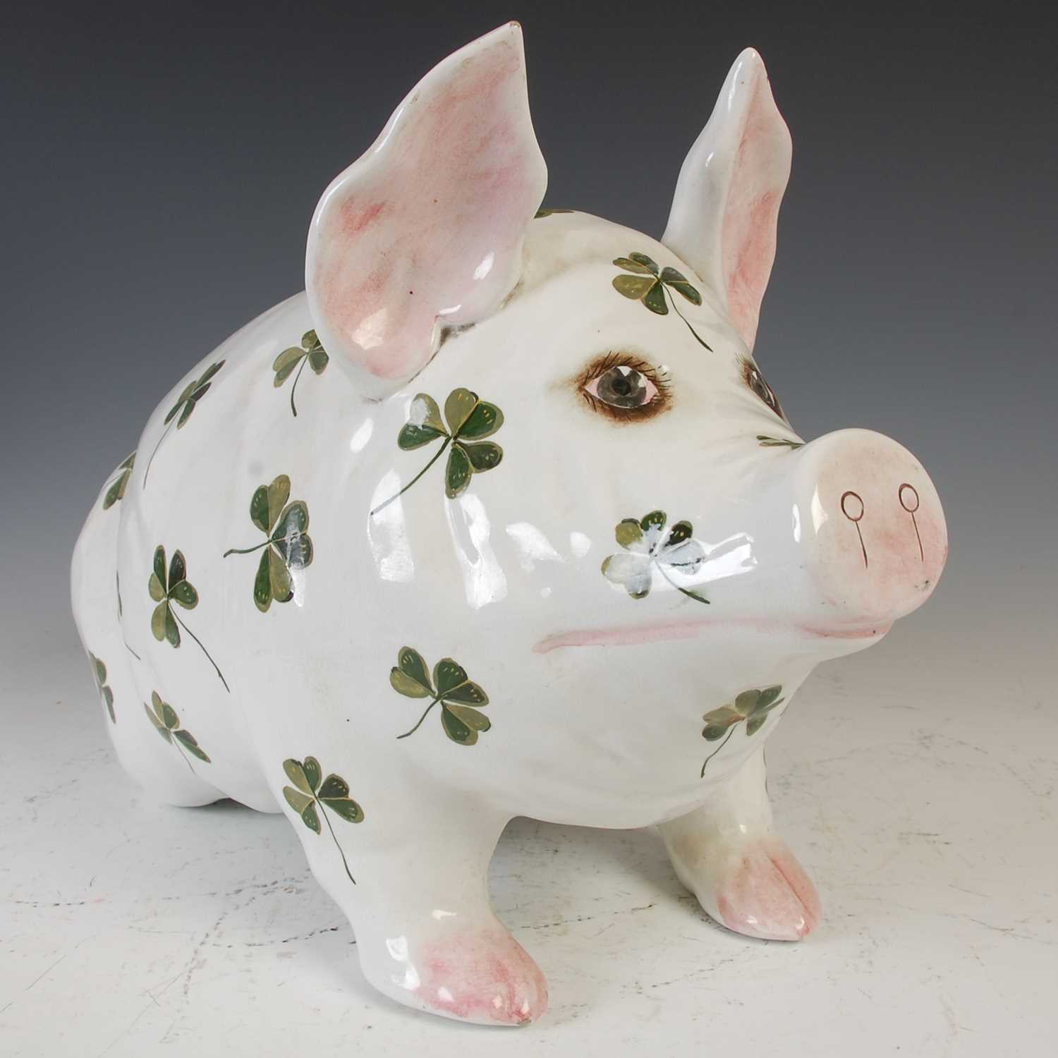 Lot 793 - A Wemyss pottery pig, decorated with shamrocks,...