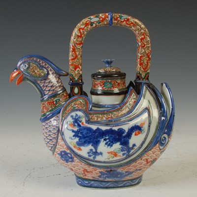 Lot 829 - A Japanese porcelain tea pot and cover,...