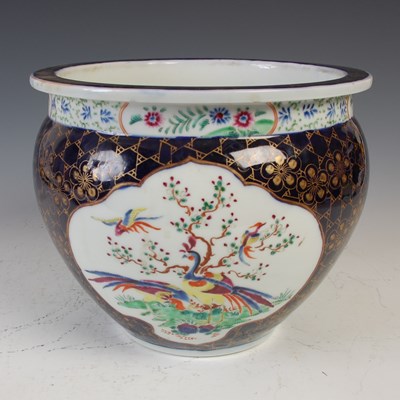 Lot 830 - A Japanese blue ground porcelain jardiniere,...