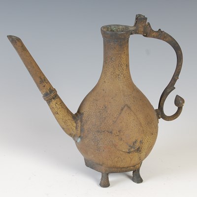 Lot 134 - An antique Persian bronze ewer, 18th/ 19th...