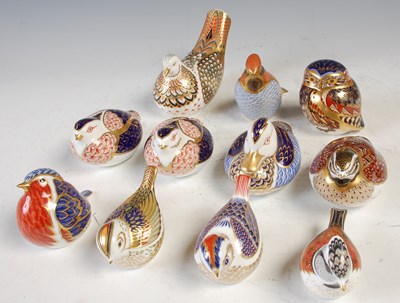 Lot 737 - A collection of eleven Royal Crown Derby bird...