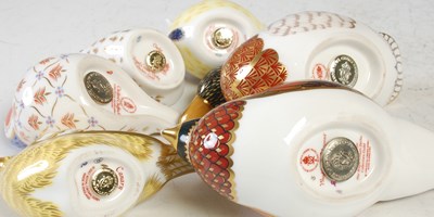 Lot 735 - A collection of ten Royal Crown Derby bird...