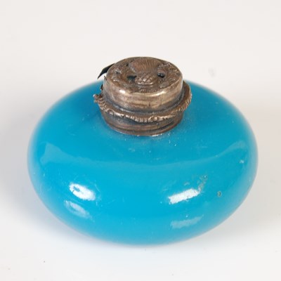 Lot 54 - A small white metal mounted blue glass scent...
