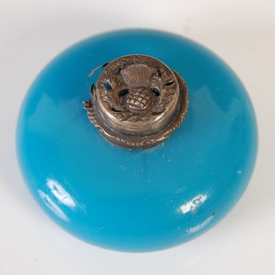 Lot 54 - A small white metal mounted blue glass scent...