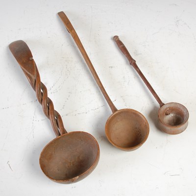 Lot 247 - A collection of three various antique treen...