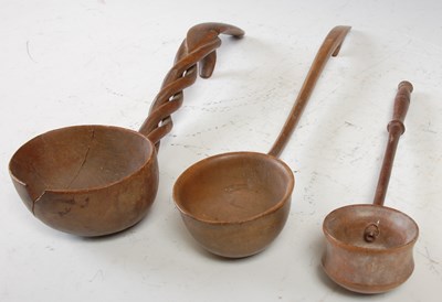 Lot 247 - A collection of three various antique treen...