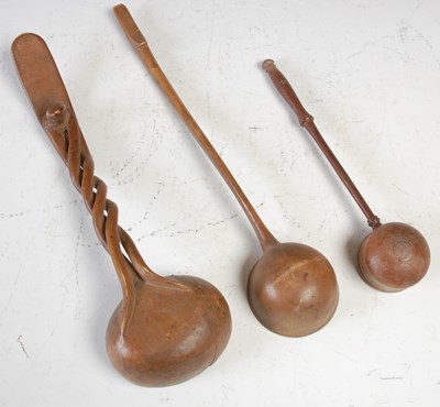 Lot 247 - A collection of three various antique treen...