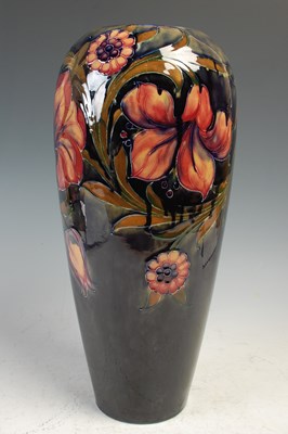 Lot 769 - A Moorcroft Spanish pattern blue ground vase,...