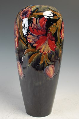 Lot 769 - A Moorcroft Spanish pattern blue ground vase,...