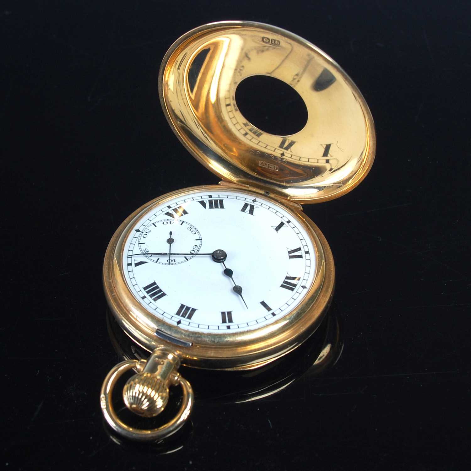 Lot 687 - An 18ct gold half-hunter pocketwatch, the...