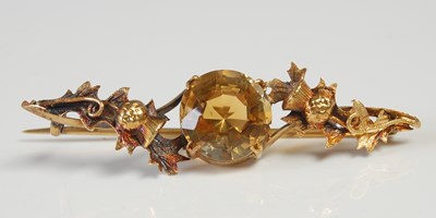 Lot 602 - A 15ct gold brooch centred with citrine...