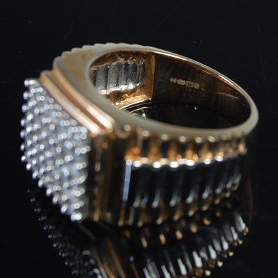 Lot 650 - A 9ct yellow and white gold gem set gentlemans...