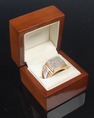 Lot 650 - A 9ct yellow and white gold gem set gentlemans...