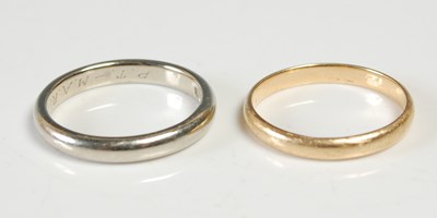 Lot 677 - Two 18ct gold rings, one white gold, size N, 3....