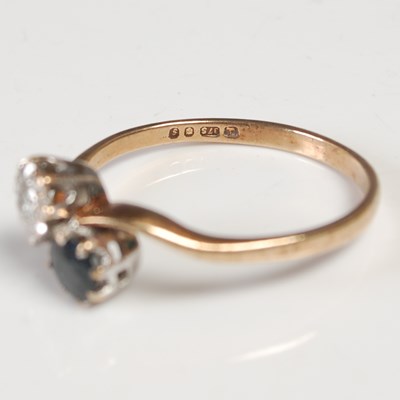 Lot 622 - A 9ct gold, diamond and sapphire two stone...