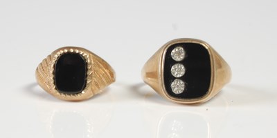 Lot 649 - Two 9ct gold and black onyx set signet...