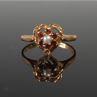 Lot 527 - A 9ct gold, garnet and pearl set heart shaped...