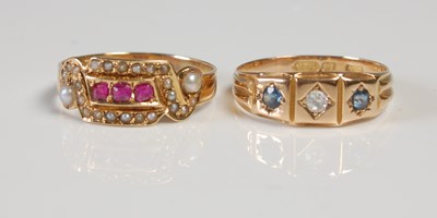 Lot 666 - Two 15ct gold dress rings, one with split...