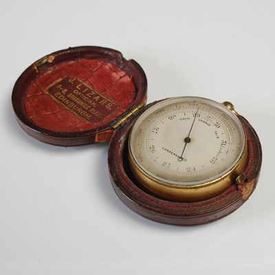 Lot 214 - An antique pocket barometer, with silvered...
