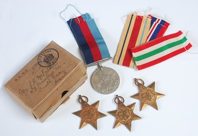 Lot 239 - A group of WWII medals, to include Africa Star...