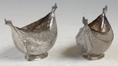 Lot 463 - A pair of Indian white metal oval shaped salts,...