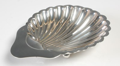 Lot 479 - A Chester silver shell shaped dish, makers...