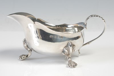 Lot 497 - A Birmingham silver sauce boat, with foliate...