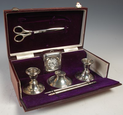 Lot 462 - A leather cased Birmingham silver mounted...