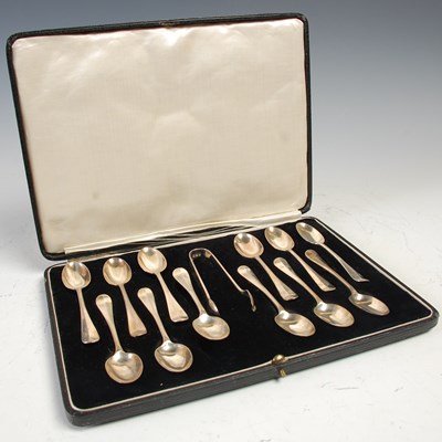 Lot 464 - A cased set of twelve London silver tea spoons...