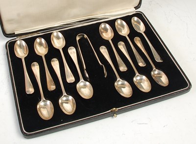 Lot 464 - A cased set of twelve London silver tea spoons...