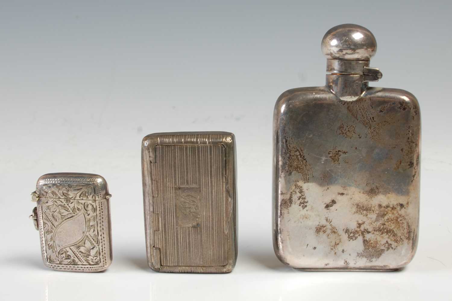 Lot 488 - A small Sheffield silver hip flask, 10cm high,...