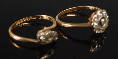 Lot 634 - Two yellow metal gem set dress rings, gross...