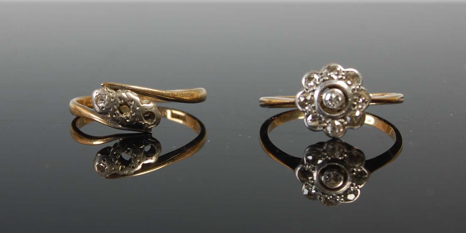 Lot 634 - Two yellow metal gem set dress rings, gross...