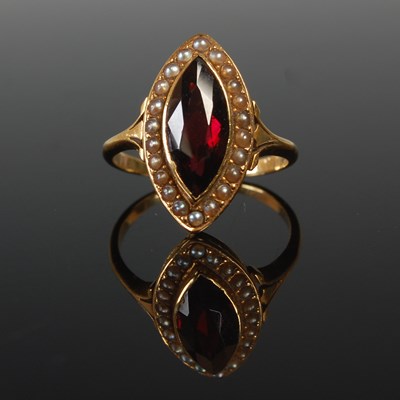 Lot 561 - A yellow metal, garnet and split pearl dress...