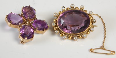 Lot 676 - A yellow metal, amethyst and split pearl oval...