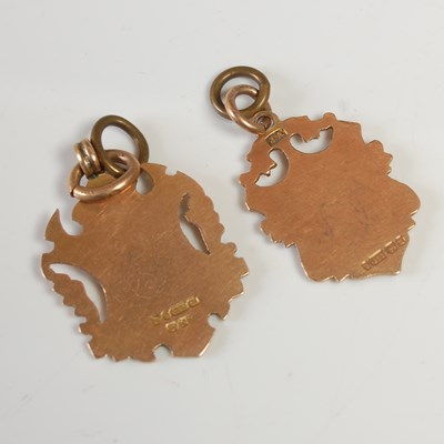 Lot 639 - Two 9ct gold shield shaped pendants, gross...