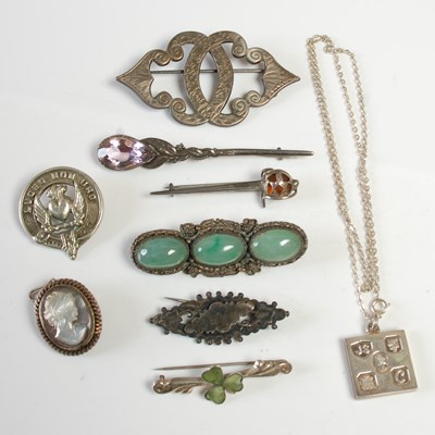 Lot 616 - An Edinburgh silver square shaped pendant and...