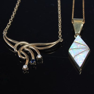 Lot 640 - A 9ct gold necklace suspending gem stone...