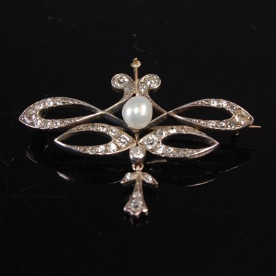Lot 657 - An early 20th century yellow and white metal,...