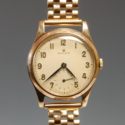 Lot 698 - A vintage 9ct gold Rolex bracelet...