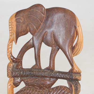 Lot 32 - A pair of African carved and pierced wood...