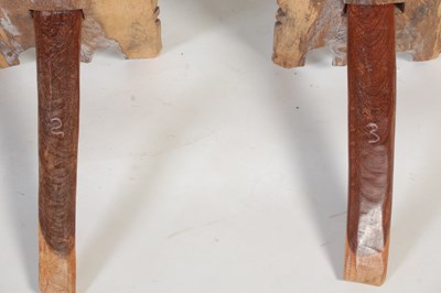 Lot 32 - A pair of African carved and pierced wood...