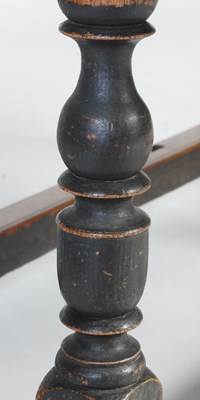 Lot 13 - An antique oak gate-leg dining table, the oval...